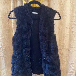 Black faux fur vest